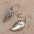Heart shaped silver mother of pearl pendant on silver labradorite necklace